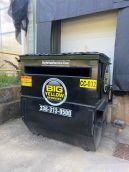 4 Yard, 6 Yard, and 8 Yard Commercial Front Load Dumpsters line up in Alamance County